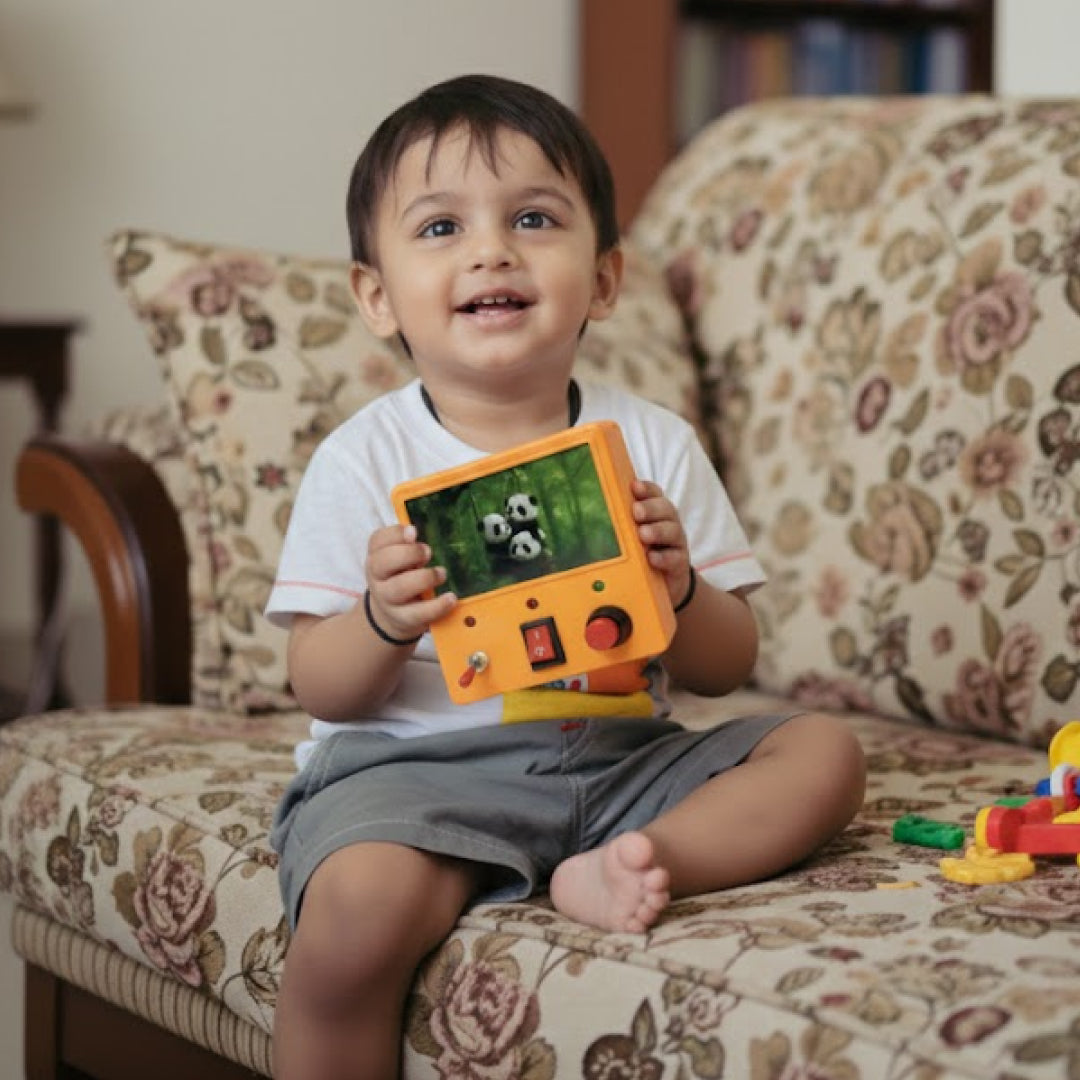 Orange Montessori Switch Board Toy | Pikinest LED Busy Board